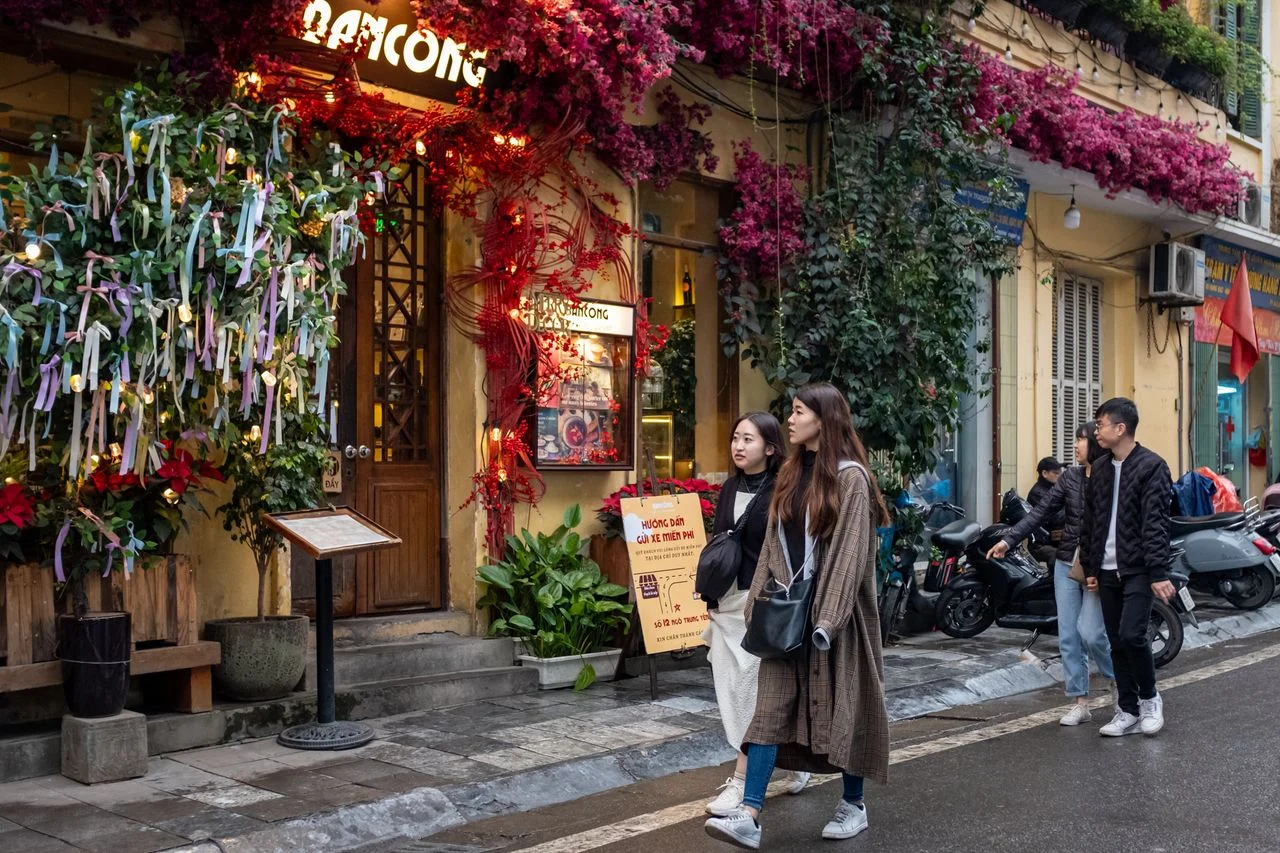 Hanoi’s Old Quarter, fly north from Hue